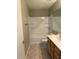 Bathroom with single sink vanity, combination tub and shower, toilet and tiled floors at 3700 E Sandwick Dr, San Tan Valley, AZ 85140