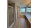 A primary bathroom featuring a glass shower, separate soaking tub, and dual sink vanity at 3700 E Sandwick Dr, San Tan Valley, AZ 85140