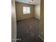 A bedroom with carpet flooring, neutral walls, and a window at 3700 E Sandwick Dr, San Tan Valley, AZ 85140