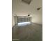 This is an empty garage with a concrete floor at 3700 E Sandwick Dr, San Tan Valley, AZ 85140