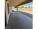 Covered patio with a concrete floor overlooking a spacious backyard at 3700 E Sandwick Dr, San Tan Valley, AZ 85140