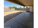 Covered patio with a concrete floor overlooking a spacious backyard at 3700 E Sandwick Dr, San Tan Valley, AZ 85140