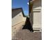 A view of the side yard with gravel landscaping at 3700 E Sandwick Dr, San Tan Valley, AZ 85140