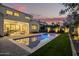 Backyard featuring a sparkling pool, covered patio and views of the home's rear exterior at 4007 N 34Th St, Phoenix, AZ 85018