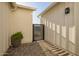 Serene outdoor space with modern fence, stone pavers, and tranquil plants at 4007 N 34Th St, Phoenix, AZ 85018