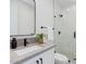 Modern bathroom featuring sleek countertops, a glass shower, and contemporary fixtures for a spa-like experience at 4007 N 34Th St, Phoenix, AZ 85018