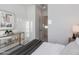 Bright bedroom featuring a mirrored console table, and neutral decor, creating a serene and stylish retreat at 4007 N 34Th St, Phoenix, AZ 85018