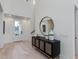 Welcoming entryway with light hardwood floors, high ceilings, and stylish modern decor at 4007 N 34Th St, Phoenix, AZ 85018