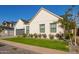 Charming single-Gathering home featuring crisp white siding, lush landscaping, and a well-manicured lawn at 4007 N 34Th St, Phoenix, AZ 85018