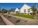 Charming single-Gathering home featuring crisp white siding, lush landscaping, and a well-manicured lawn at 4007 N 34Th St, Phoenix, AZ 85018