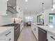 Modern kitchen features stainless steel appliances, light wood floors, and a bright, open layout at 4007 N 34Th St, Phoenix, AZ 85018