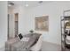 Bright office space with a sleek gray desk, laptop, modern decor, and ample natural light at 4007 N 34Th St, Phoenix, AZ 85018