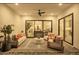 Inviting covered patio featuring a cozy seating area with a ceiling fan at 4007 N 34Th St, Phoenix, AZ 85018
