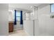Contemporary bathroom with a large glass-enclosed shower and neutral finishes at 4115 S 180Th Dr, Goodyear, AZ 85338