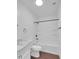 Updated bathroom with a marble vanity, and shower over tub at 4337 E Wilshire Dr, Phoenix, AZ 85008