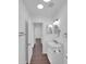 Updated bathroom with a marble vanity, recessed lighting, and hall access at 4337 E Wilshire Dr, Phoenix, AZ 85008