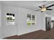 Bright living room with backyard access and view to backyard swimming pool at 4337 E Wilshire Dr, Phoenix, AZ 85008