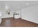 Open concept living space with new flooring, fresh paint, updated fixtures and bright natural light at 4337 E Wilshire Dr, Phoenix, AZ 85008
