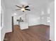 Open floor plan shows kitchen with new appliances, adjacent to living room at 4337 E Wilshire Dr, Phoenix, AZ 85008
