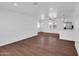 Open concept living space with new flooring, fresh paint, updated fixtures and bright natural light at 4337 E Wilshire Dr, Phoenix, AZ 85008