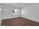 Living space with new flooring, paint and bright natural light at 4337 E Wilshire Dr, Phoenix, AZ 85008