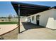 Covered patio with ceiling fans offers a great space for entertaining and outdoor living at 4337 E Wilshire Dr, Phoenix, AZ 85008