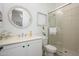 Clean bathroom featuring a glass-enclosed shower, white vanity, and modern fixtures at 4450 S Frequency --, Mesa, AZ 85212