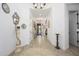 Spacious entryway with wood flooring and bright white walls and decor at 4450 S Frequency --, Mesa, AZ 85212