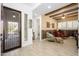 Bright and open entryway, with wood floors, and ample seating area at 4450 S Frequency --, Mesa, AZ 85212