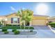 Inviting home featuring desert landscaping, a well-maintained lawn, and a spacious two-car garage at 4450 S Frequency --, Mesa, AZ 85212