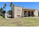 View of the well-maintained building with architectural features and landscaping at 5742 N 43Rd Dr, Glendale, AZ 85301