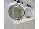 This bathroom features double sinks and stylish lighting at 6813 W Sherri Jean Ln, Peoria, AZ 85382