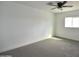 This bedroom features a window letting in natural light at 6813 W Sherri Jean Ln, Peoria, AZ 85382