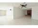 Spacious living area features marble flooring and a classic brick fireplace adding warmth at 6813 W Sherri Jean Ln, Peoria, AZ 85382