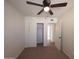 Comfortable bedroom featuring neutral carpet, ceiling fan, and spacious closet, ideal for restful nights and easy organization at 720 S Dobson Rd # 24, Mesa, AZ 85202