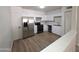 Well-appointed kitchen featuring modern appliances, white cabinets, and sleek countertops, perfect for culinary adventures at 720 S Dobson Rd # 24, Mesa, AZ 85202