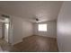 Inviting living room with wood flooring, ceiling fan, and natural light, ideal for comfortable living at 720 S Dobson Rd # 24, Mesa, AZ 85202
