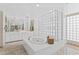 Luxurious bathroom with soaking tub and glass block shower at 7272 N 71St St, Paradise Valley, AZ 85253