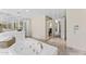 Elegant bathroom featuring a soaking tub and dual vanities at 7272 N 71St St, Paradise Valley, AZ 85253