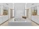 Bathroom featuring a large soaking tub and separate vanities at 7272 N 71St St, Paradise Valley, AZ 85253