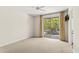 Bright bedroom with a sliding glass door that leads to an outdoor patio at 7272 N 71St St, Paradise Valley, AZ 85253
