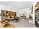 Comfortable living room with custom built-in shelving, recessed lighting, and neutral decor at 7272 N 71St St, Paradise Valley, AZ 85253
