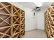 Custom-built wine cellar featuring wooden racks for storing wine bottles at 7272 N 71St St, Paradise Valley, AZ 85253