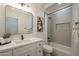 Beautiful bathroom with a shower-over-tub, stylish vanity, and modern fixtures at 7296 E San Alfredo Dr, Scottsdale, AZ 85258