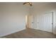 A bright bedroom featuring hardwood floors and neutral walls at 7296 E San Alfredo Dr, Scottsdale, AZ 85258