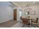 Charming dining room with a modern chandelier and seating for four at 7296 E San Alfredo Dr, Scottsdale, AZ 85258