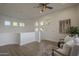 Bright loft area with natural light, neutral decor, and seating provides a versatile space at 7296 E San Alfredo Dr, Scottsdale, AZ 85258