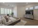 Spacious main bedroom featuring a TV, a sitting bench, and recessed lighting at 7296 E San Alfredo Dr, Scottsdale, AZ 85258