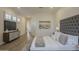 Well-lit main bedroom featuring a TV, and minimalist design at 7296 E San Alfredo Dr, Scottsdale, AZ 85258