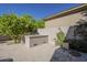 Outdoor kitchen area with built-in grill and tiled patio, perfect for alfresco dining and entertaining at 7296 E San Alfredo Dr, Scottsdale, AZ 85258